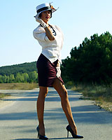 leggy milf in shiny pantyhose