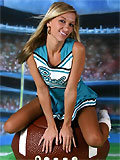 long-legged blonde teen in cheerleader's uniform posing with big ball